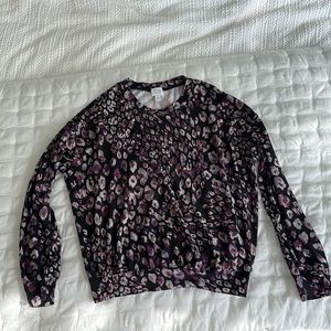 Flower cheetah print top. Super soft. Fitted waist for a float vibe.